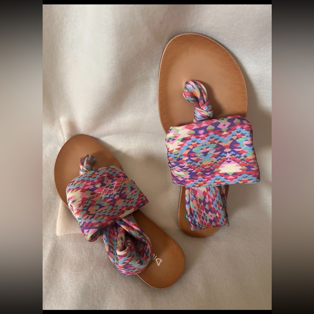 Sandals with soft pastel colors